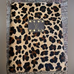 Upcycled brown imitation calf hair cheetah print notebook cover.